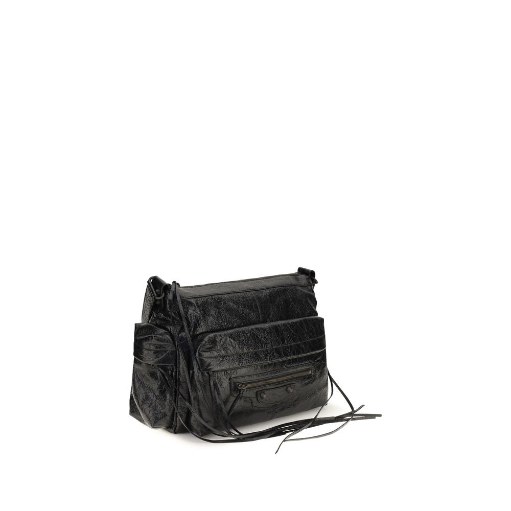 Medium 2-in-1 Shoulder & Crossbody Bag by Balenciaga for men in brass zamak & calf leather black features an effortlessly chic silhouette with a secure zipper, ample , and versatile crossbody-strap, shoulder-strap & adjustable-strap for effortlessly chic everyday luxury.