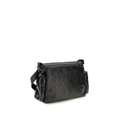 Medium 2-in-1 Shoulder & Crossbody Bag by Balenciaga for men in brass zamak & calf leather black showcases a statuesque silhouette, artfully detailed with a secure zipper, organized , and versatile crossbody-strap, shoulder-strap & adjustable-strap for a statuesque look.