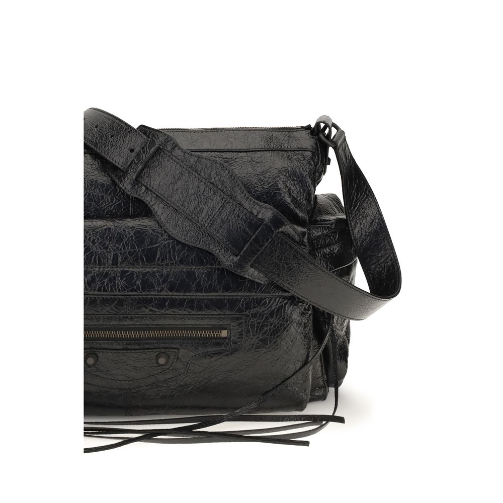 Medium 2-in-1 Shoulder & Crossbody Bag by Balenciaga for men in brass zamak & calf leather black features a effortless chic silhouette with a secure zipper, ample , and versatile crossbody-strap, shoulder-strap & adjustable-strap for a effortless chic finish.