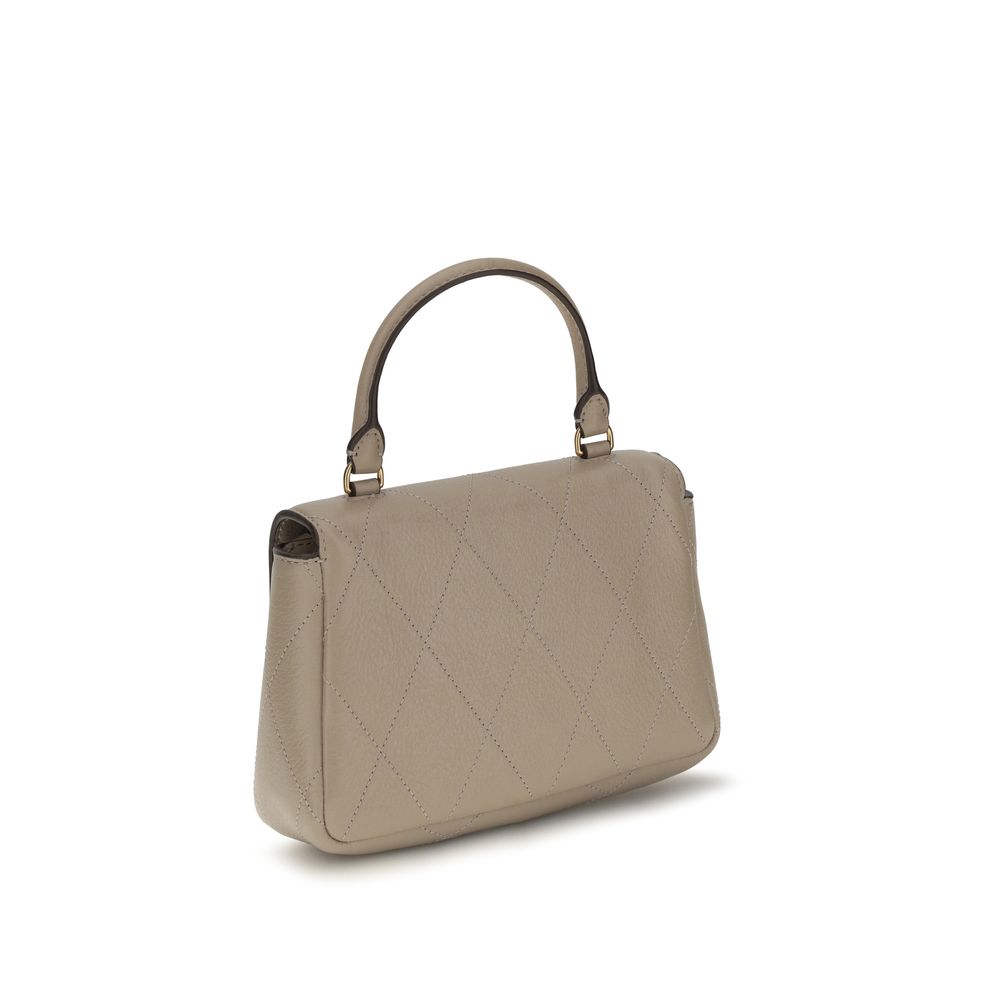 Mini Quilted Flap Handbag by Tory Burch for women in bos taurus calf grained leather beige features a refined silhouette, showcasing a secure flap, zipper & magnetic, organized cardholder, and versatile adjustable-strap & handle for a refined finish.
