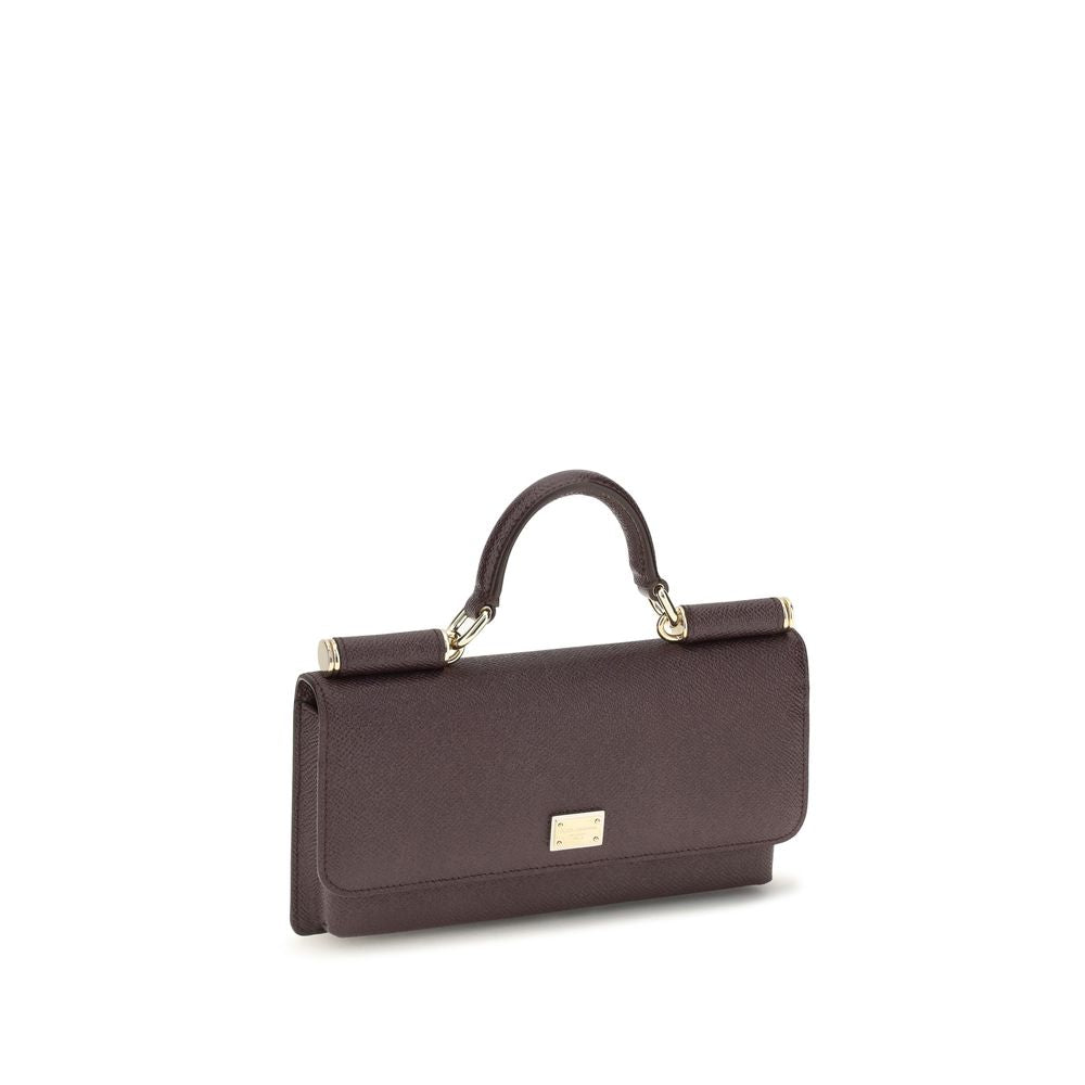 Micro Shoulder Flap Bag by Dolce & Gabbana for women in bos taurus calf leather brown & signature showcases a statuesque silhouette, artfully detailed with a secure flap, magnetic & button, organized , and versatile shoulder-strap & handle for a statuesque look.