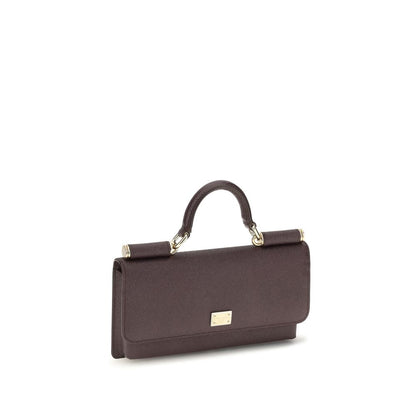 Micro Shoulder Flap Bag by Dolce & Gabbana for women in bos taurus calf leather brown & signature showcases a statuesque silhouette, artfully detailed with a secure flap, magnetic & button, organized , and versatile shoulder-strap & handle for a statuesque look.