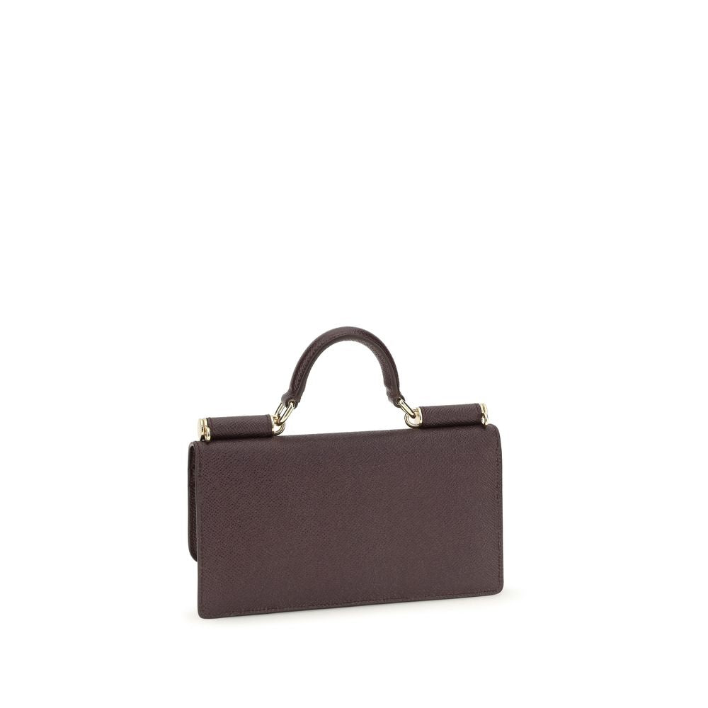 Micro Shoulder Flap Bag by Dolce & Gabbana for women in bos taurus calf leather brown & signature features an effortlessly chic silhouette with a secure flap, magnetic & button, ample , and versatile shoulder-strap & handle for effortlessly chic everyday luxury.