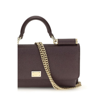 Micro Shoulder Flap Bag by Dolce & Gabbana for women in bos taurus calf leather brown & signature features a statuesque silhouette, showcasing a secure flap, magnetic & button and statuesque with versatile shoulder-strap & handle for a statuesque finish.