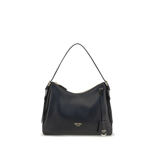Shoulder Bag by Prada for women in bos taurus calf leather black features a stately silhouette, showcasing a secure zipper, ample , and stately shoulder-strap & adjustable-strap for a stately finish.