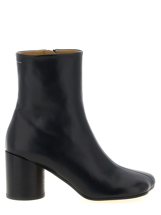 Ankle Boots by MM6 Maison Margiela for women in polyester nappa leather black, white & signature features an enchanting design from the Women's Polyester Nappa Leather Ankle Boots collection, highlighting a enchanting block-heel and for a refined look.