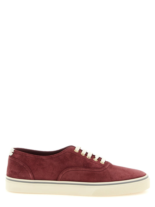 Sneakers by Brunello Cucinelli for men in suede calfskin leather bordeaux, burgundy & gold presents a on trend silhouette from the Men's Low Top Suede Calfskin Leather Sneakers collection, showcasing a on trend low-top style for an elevated aesthetic.