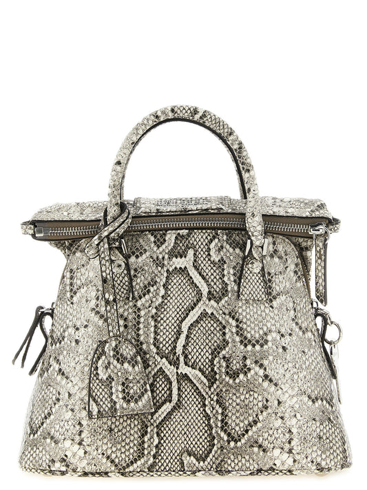 Mini Shoulder Bag by Maison Margiela for women in pvc & leather gray, silver, signature-print & print features a effortless chic silhouette with a secure , ample , and versatile shoulder-strap for a effortless chic finish.