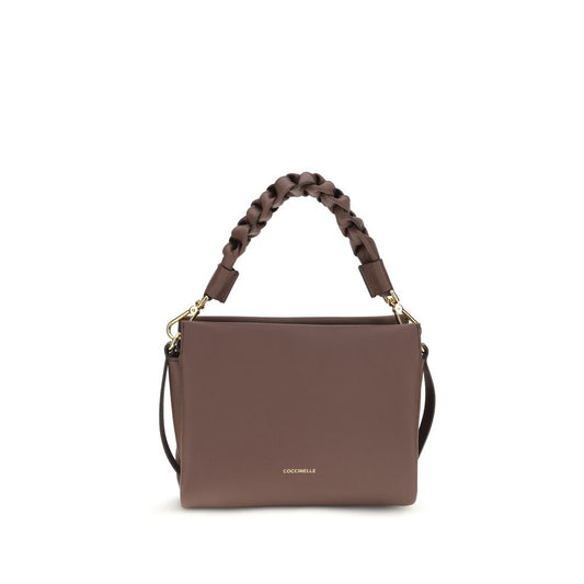 Handbag by Coccinelle for women in bos taurus calf leather bicolour presents a ornamental silhouette, showcasing a secure , ample , and versatile for a ornamental finish.
