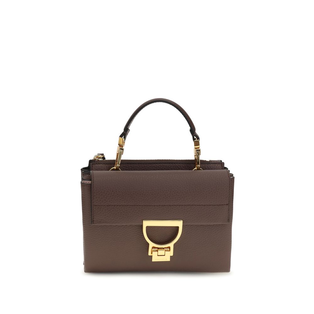 Flap Handbag by Coccinelle for women in bos taurus calfskin leather brown, gold & monogram features a exquisite silhouette, showcasing a secure flap & zipper and exquisite with versatile shoulder-strap, handle & adjustable-strap for a exquisite finish.