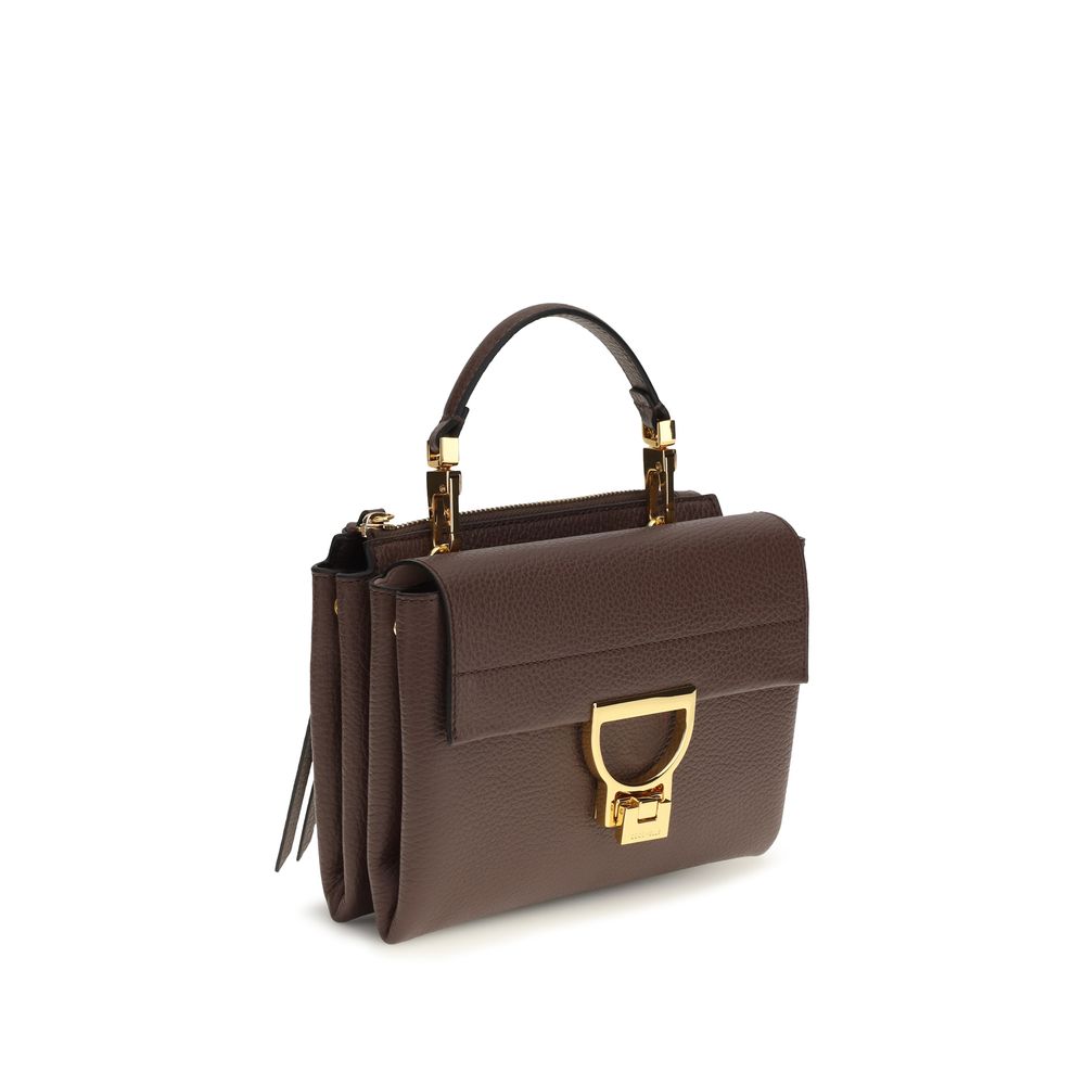 Flap Handbag by Coccinelle for women in bos taurus calfskin leather brown, gold & monogram features an refined silhouette, showcasing a secure flap & zipper, ample , and versatile shoulder-strap, handle & adjustable-strap for a sophisticated refined aesthetic.