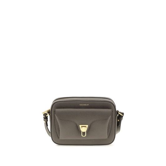 Shoulder Flap Bag by Coccinelle for women in bos taurus calfskin leather brown, gold & monogram features a statuesque silhouette, showcasing a secure flap & zipper and statuesque with versatile shoulder-strap & adjustable-strap for a statuesque finish.