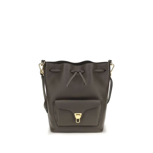 Bucket Handbag by Coccinelle for women in bos taurus calf grained leather brown, gold & signature features a effortlessly chic silhouette, showcasing a secure zipper & drawstring with ample external-pockets and versatile adjustable-strap & handle for a effortlessly chic finish.