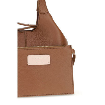 This Small Crossbody Pouch Handbag by Coccinelle for women in bos taurus calf grained leather and brown & gold presents a sculptural silhouette featuring a secure zipper & button, ample , and versatile crossbody-strap, handle, adjustable-strap & detachable-strap for a sculptural finish.