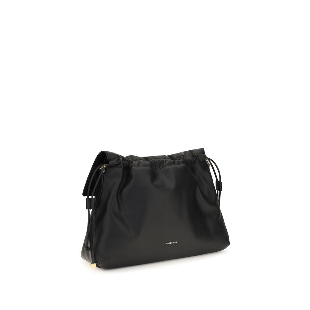 Medium Shoulder Drawstring Bag by Coccinelle for women in bos taurus calf leather black, gold & signature features a stately silhouette, showcasing a secure drawstring, ample , and stately shoulder-strap, adjustable-strap & handle for a stately finish.
