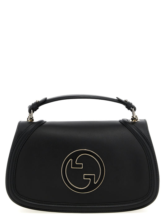 Medium Flap Handbag by Gucci for women in calfskin leather black presents a ornamental silhouette, showcasing a secure flap & magnetic, ample , and versatile shoulder-strap, handle & adjustable-strap for a ornamental finish.