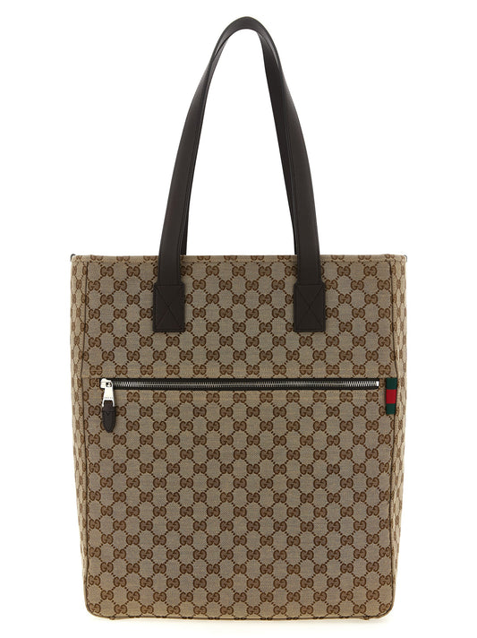 Shoulder Bag by Gucci for men in cotton leather & polyester brown & signature features a effortless sophistication silhouette, secured by a zipper with ample and versatile shoulder-strap & handle for a effortless sophistication finish.