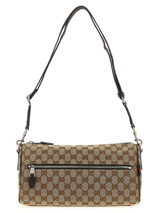 Small Crossbody Messenger Bag by Gucci for men in poly cotton & leather beige features a statement-making Gg Poly Cotton & Leather Small Crossbody Messenger Bag design with a secure zipper, statement-making , and versatile crossbody-strap, shoulder-strap & adjustable-strap for a sophisticated look.