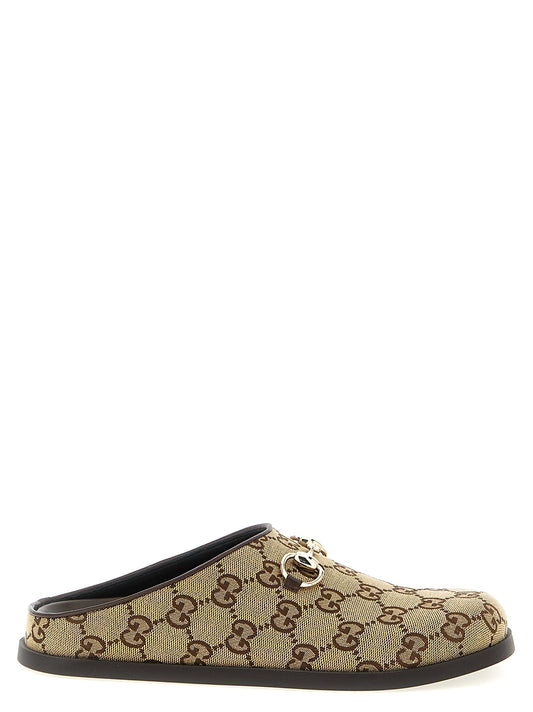 Mules Flat Shoes by Gucci for women in polyester cotton & leather beige & signature showcases a resplendent Gg Women's Polyester Cotton & Leather Mules Flat Shoes aesthetic with a and .