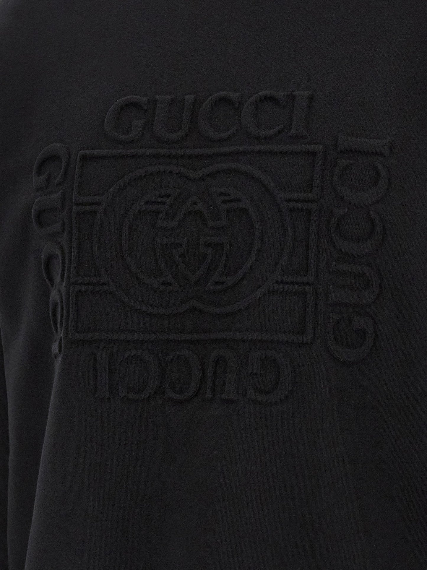 Sweatshirt by Gucci for men in cotton black features an provocated silhouette, detailed with a provocated and a refined for a sophisticated aesthetic.