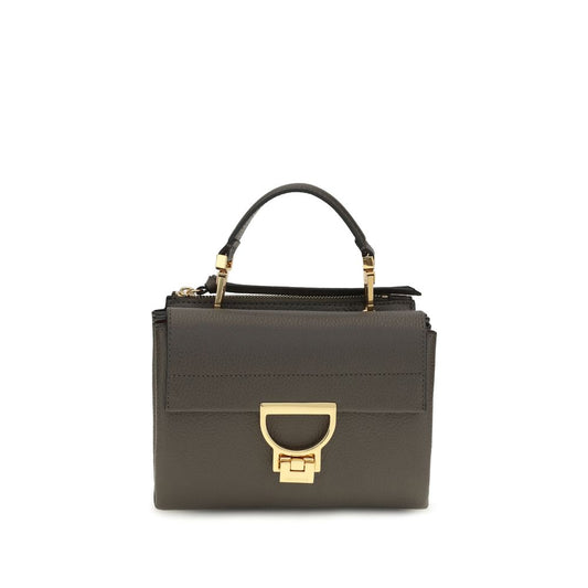 Flap Handbag by Coccinelle for women in bos taurus calfskin leather brown, gold & monogram features a exquisite silhouette, showcasing a secure flap & zipper and exquisite with versatile shoulder-strap, handle & adjustable-strap for a exquisite finish.