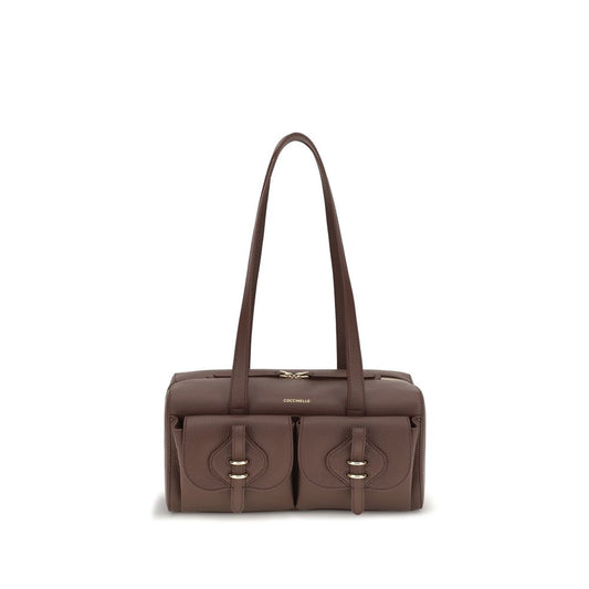 Shoulder Bag by Coccinelle for women in bos taurus calf leather brown presents a statuesque silhouette, showcasing a secure zipper and statuesque with versatile shoulder-strap & handle for a sophisticated look.