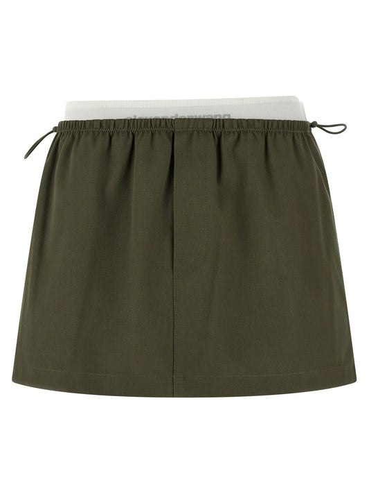 Skirt by Alexander Wang for women in cotton bicolour & green features a captivating silhouette, showcasing the captivating Women's Cotton Skirt design with a sophisticated mini long for a captivating look.