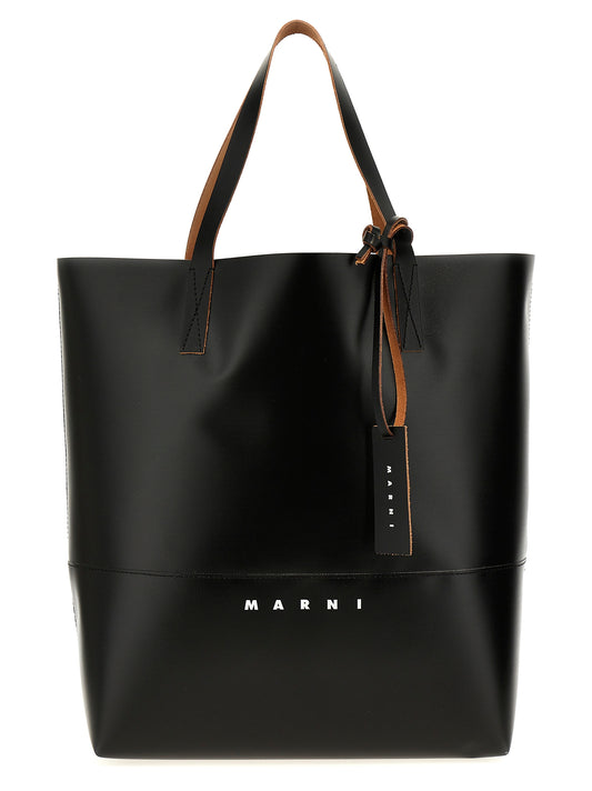 This Shopper Tote Bag by Marni for men in polyester polyurethane leather black, signature & print features an on trend Tribeca Polyester Polyurethane Leather Shopper Tote Bag design with a secure , ample external-pockets, and on trend handle.
