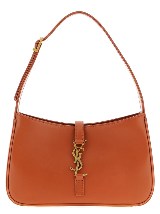 Shoulder Bag by Saint Laurent for women in suede calfskin leather orange features a enviable silhouette, showcasing a secure , ample , and enviable shoulder-strap, adjustable-strap & handle for a enviable finish.