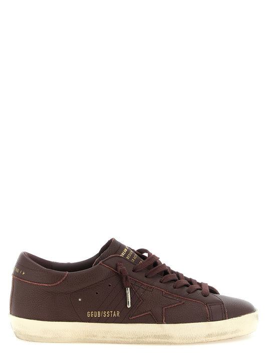Sneakers by Golden Goose for men in bos taurus cowhide leather bordeaux, gold & signature features an timeless silhouette from the Icons Star Men's Low Top Bos Taurus Cowhide Leather Sneakers collection, showcasing a signature low-top style with an timeless finish.