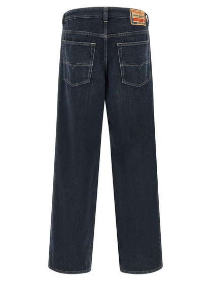 Jeans by Diesel for men in denim cotton dark-blue & signature features a refined silhouette with a refined straight-leg, relaxed-fit & wide, defined by a and a refined long for a refined finish.