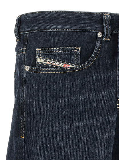 Jeans by Diesel for men in denim cotton dark-blue & signature features a polished silhouette with a polished straight-leg, relaxed-fit & wide, reaching a polished long and finished with a polished .