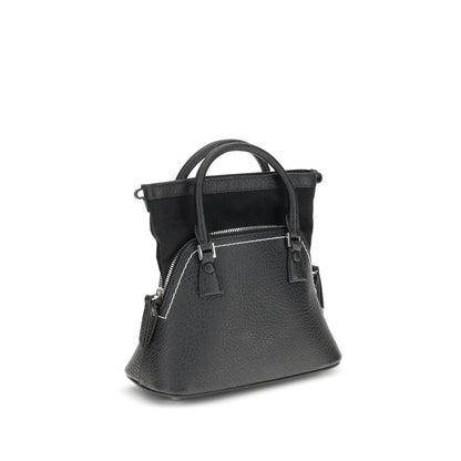 Shoulder Bag by Maison Margiela for women in bos taurus calf leather black, signature & monogram features a stately silhouette, showcasing a secure zipper, ample internal-pockets, and stately shoulder-strap, handle & adjustable-strap for a stately finish.