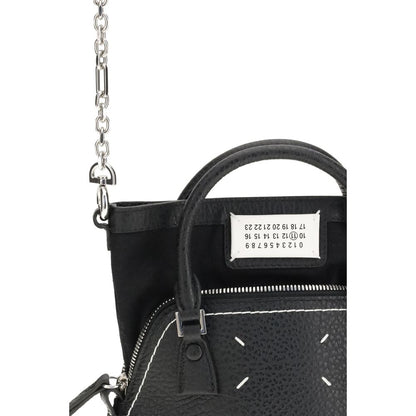 Shoulder Bag by Maison Margiela for women in bos taurus calf leather black, signature & monogram features a effortless chic silhouette with a secure zipper, ample internal-pockets, and versatile shoulder-strap, handle & adjustable-strap for a effortless chic finish.