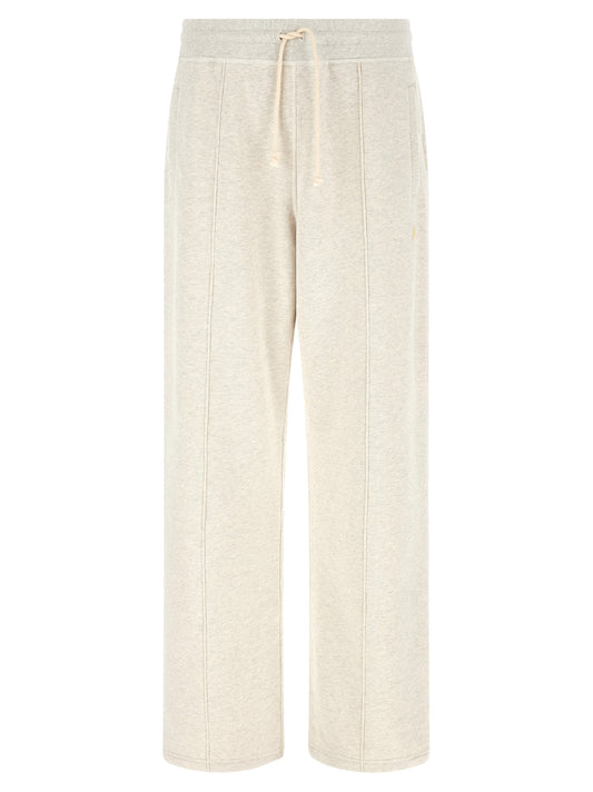 Joggers by Golden Goose for men in cotton gray presents a refined pantology silhouette, artfully defined by a refined pantology flared & wide, long, and a sophisticated .