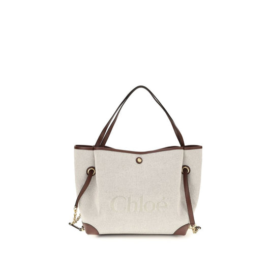 Shoulder Tote Bucket Bag by Chloé for women in calfskin leather beige & gold features a effortless chic silhouette with a secure , ample , and versatile shoulder-strap for a effortless chic finish.