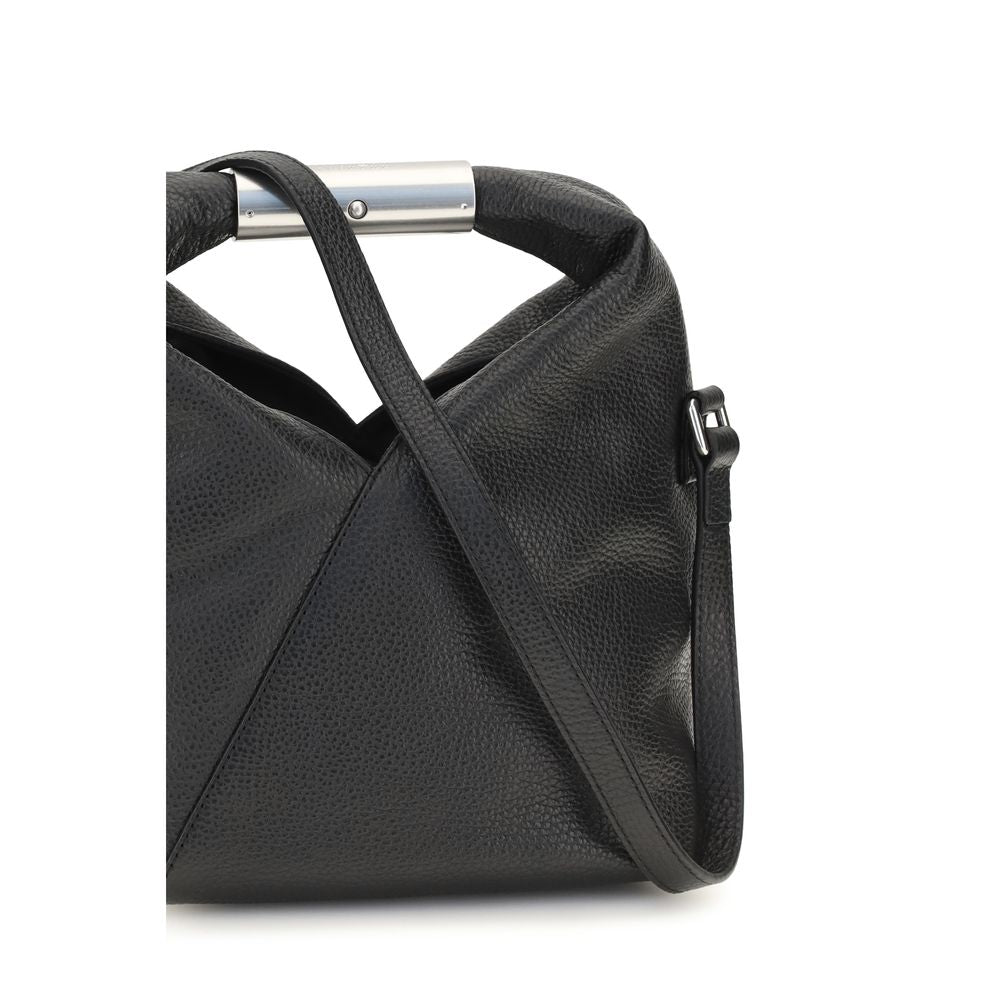 Mini Shoulder Bag by MM6 for women in bos taurus calf leather black, white & signature features a effortless sophistication silhouette, secured by a magnetic with ample and versatile shoulder-strap, adjustable-strap & handle for a effortless sophistication finish.
