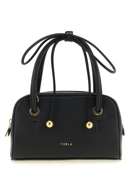 This Compact Handbag by Furla for women in bos taurus calf suede leather and black & gold presents a sculptural silhouette featuring a secure zipper, ample , and versatile shoulder-strap, adjustable-strap & handle for a sculptural finish.