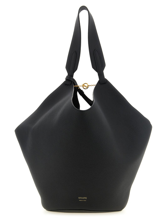 Tote Clutch Bag by Khaite for women in bos taurus calfskin leather black & gold features an jet-setting Lotus Bos Taurus Calfskin Leather Tote Clutch Bag design with a secure , jet-setting , and versatile handle for a jet-setting look.