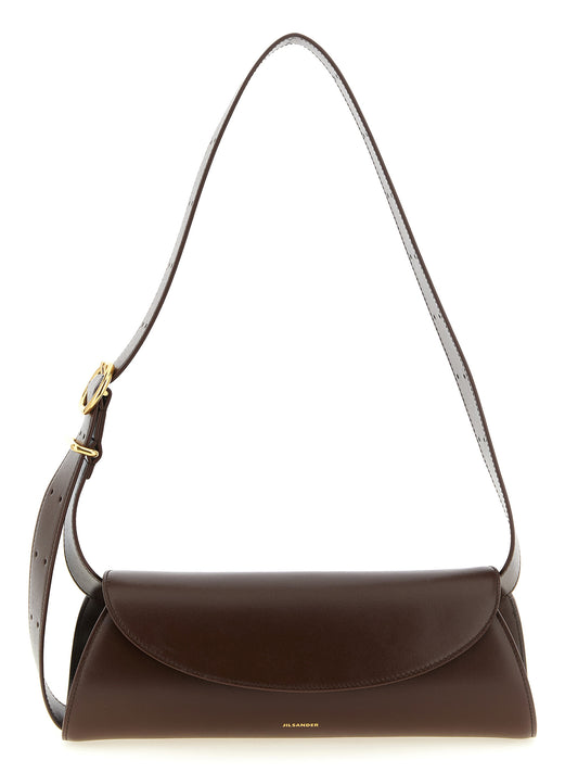 Small Shoulder Bag by Jil Sander for women in calfskin leather brown & gold presents a statuesque silhouette, showcasing a secure magnetic, buckle & button and statuesque with versatile shoulder-strap & adjustable-strap for a sophisticated look.