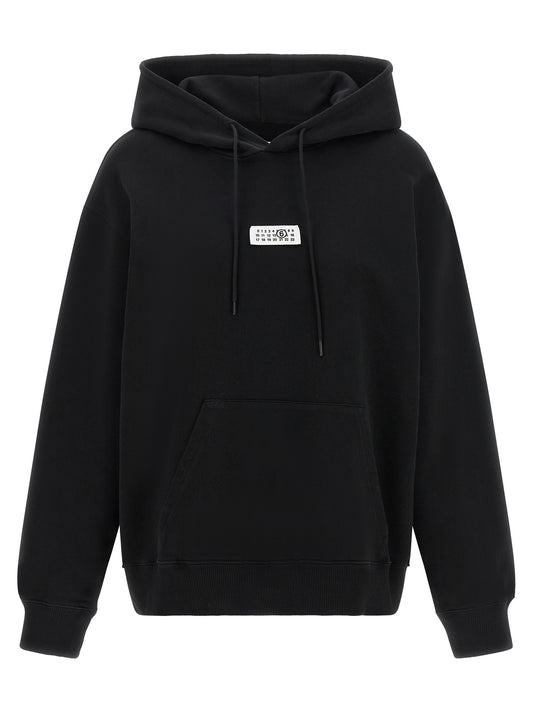 Sweatshirt Hoodie by MM6 Maison Margiela for women in cotton black, white & signature features a slouchy chic silhouette, detailed with a slouchy chic and a signature hooded neckline for an elevated aesthetic.