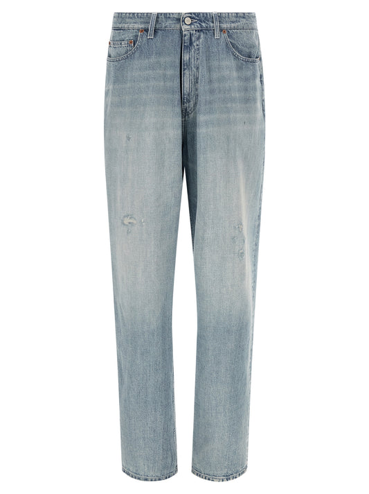 Jeans by MM6 Maison Margiela for men in denim cotton light-blue, white & signature presents a refined pantology silhouette, artfully defined by a refined pantology straight-leg & relaxed-fit, long, and a sophisticated .