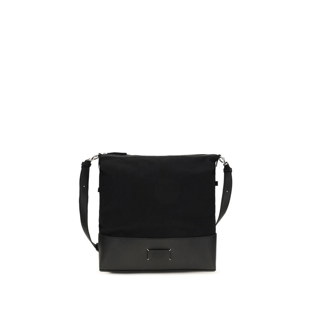 Medium Shoulder Hobo Bag by Maison Margiela for men in bos taurus calf leather black features an effortlessly chic silhouette with a secure zipper, ample , and versatile shoulder-strap & adjustable-strap for effortlessly chic everyday luxury.