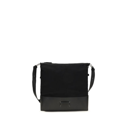 Medium Shoulder Hobo Bag by Maison Margiela for men in bos taurus calf leather black features an effortlessly chic silhouette with a secure zipper, ample , and versatile shoulder-strap & adjustable-strap for effortlessly chic everyday luxury.