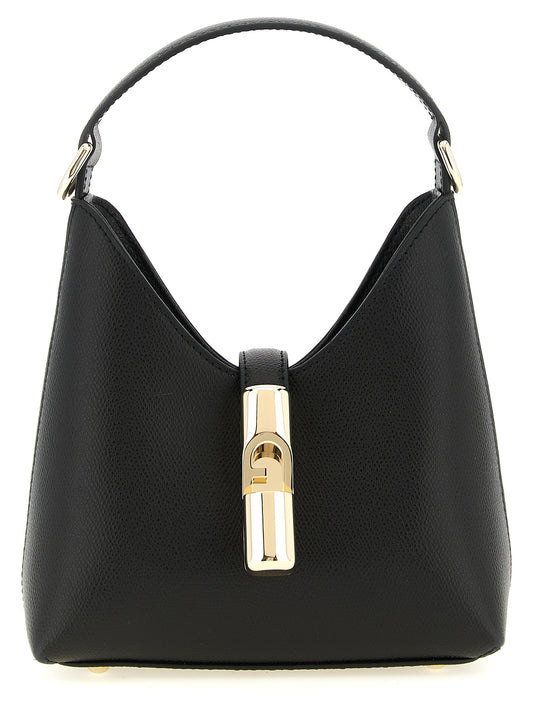 This Mini Handbag by Furla for women in calfskin leather & cotton and black & gold presents a sculptural silhouette featuring a secure zipper & clasp, ample , and versatile shoulder-strap, handle & adjustable-strap for a sculptural finish.