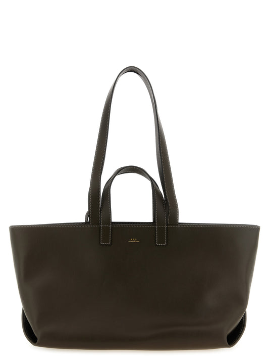 Tote Clutch Bag by A.P.C. for women in leather & cotton brown & gold features an jet-setting Le Drummer Leather & Cotton Tote Clutch Bag design with a secure , jet-setting , and versatile handle for a jet-setting look.