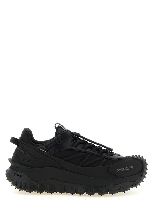 Athletic Sneakers by Moncler for men in leather black & signature showcases an impeccable silhouette, defined by an impeccable athletic style design that perfectly captures the essence of the Men's Athletic Leather Sneakers.
