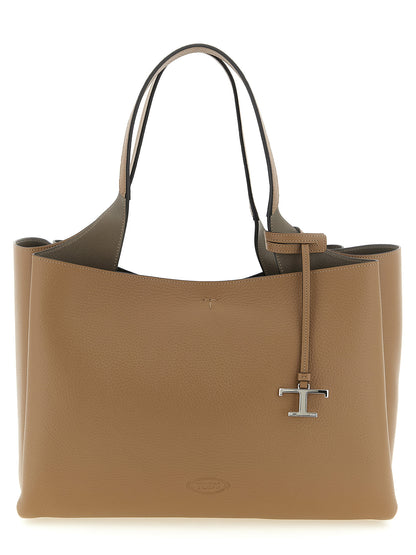 Medium Tote Bag by Tod's for women in calfskin leather brown, camel, silver & signature features an jet-setting Essence T Timeless Calfskin Leather Medium Tote Bag design with a secure hook, jet-setting built-in-compartments, and versatile handle for a jet-setting look.