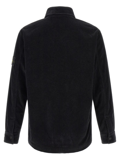 Overshirt by Stone Island for men in cotton corduroy black & signature showcases a sharp silhouette, elegantly detailed with a sharp and sharp .