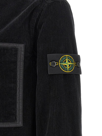 Overshirt by Stone Island for men in cotton corduroy black & signature showcases a sleek silhouette, elegantly detailed with a sleek and for a sleek finish.